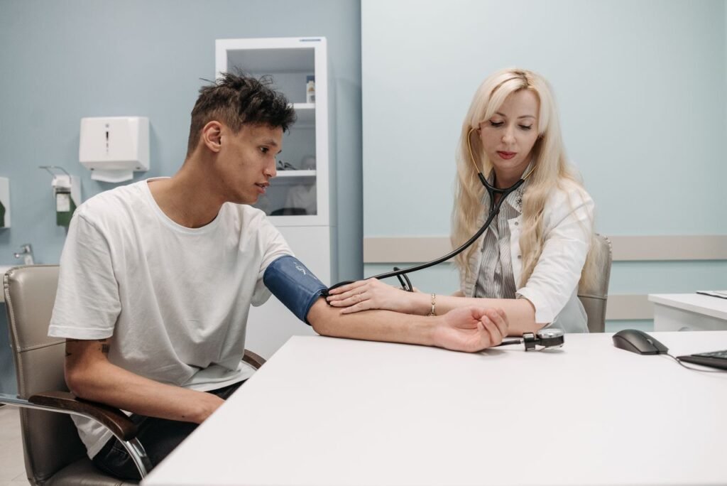Crafting Captivating Headlines: Your awesome post title goes here A doctor measures a patient's blood pressure in a clinic setting, focusing on healthcare and wellness.